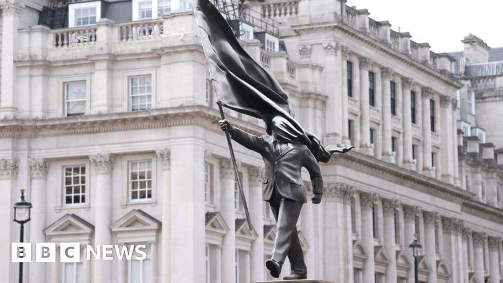 Statue with Bansky's signature appears in London