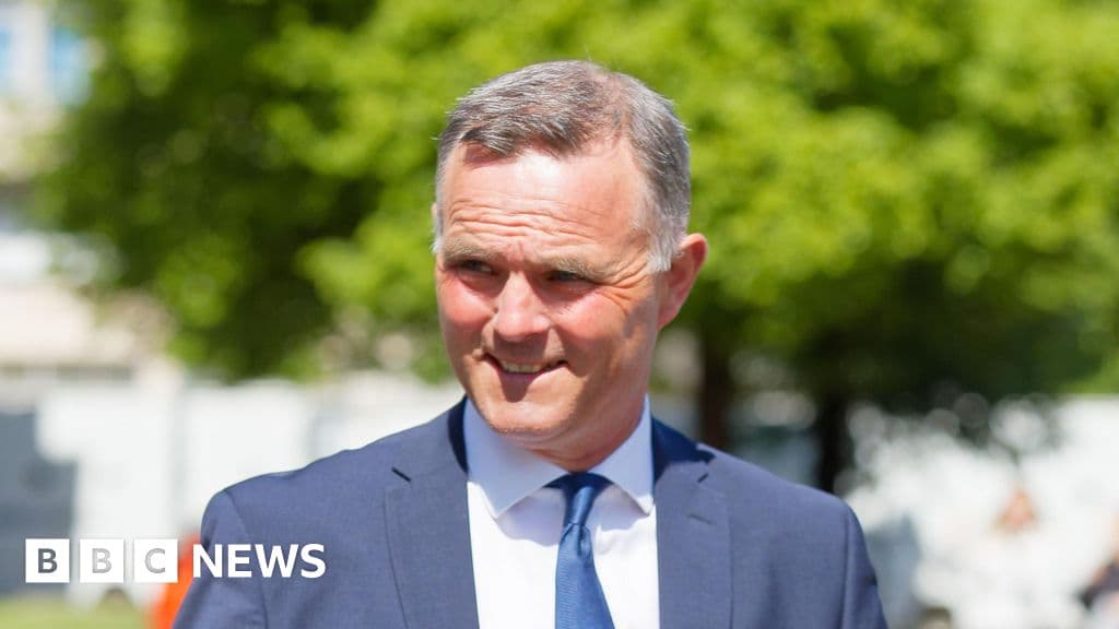 Grand National trainer jailed for beating man with hockey stick