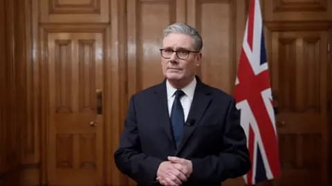 Keir Starmer in front of a union jack flag