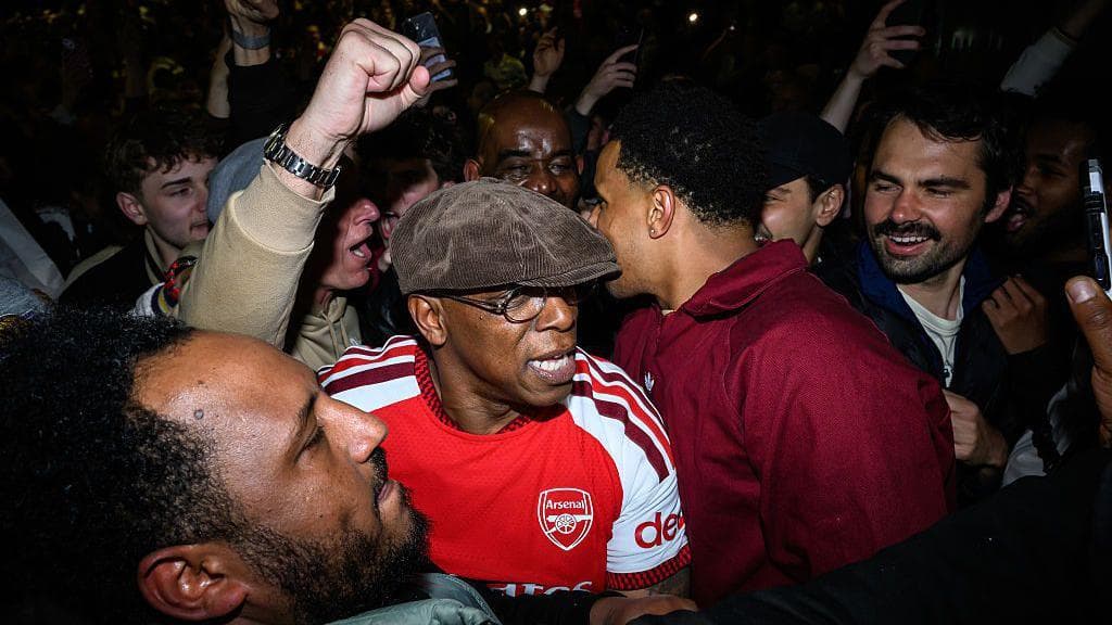 Ian Wright celebrates with Arsenal fans