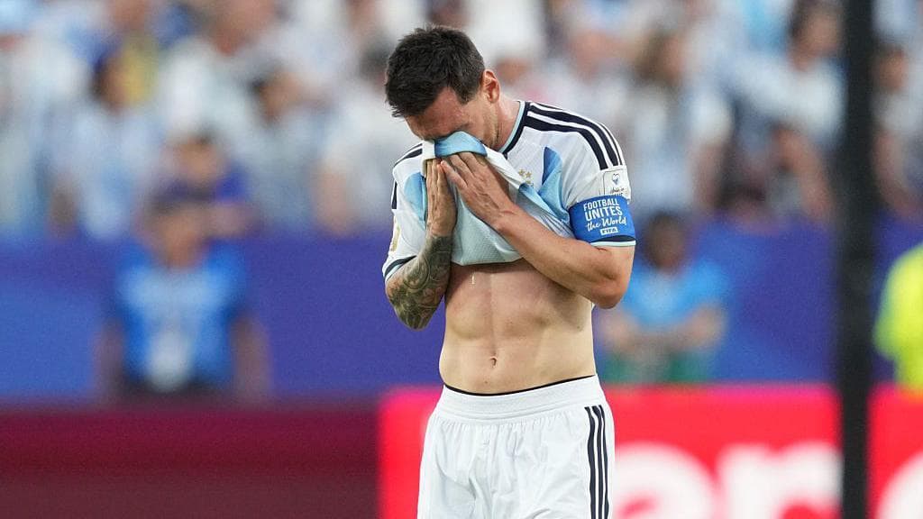 Lionel Messi holds his shirt to his face while in tears after scoring the opening goal in Argentina's 3-0 2026 FIFA World Cup victory over Argentina
