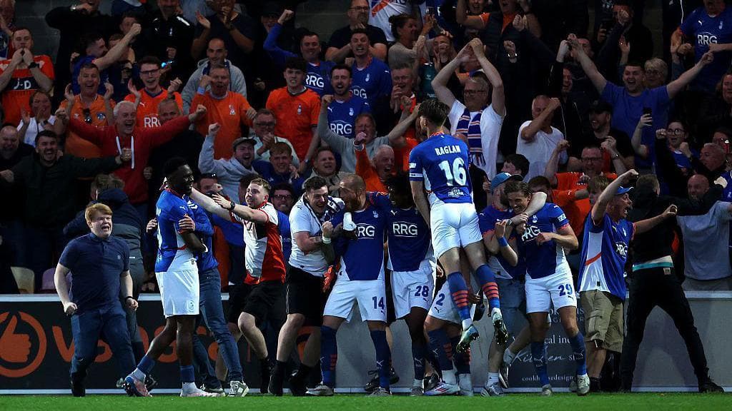 Oldham Athletic players celebrate after beating York City in the 2024-25 National league play-off smei-finals