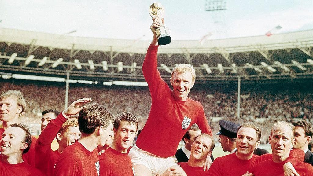 Bobby Moore lifts the World Cup trophy in 1966
