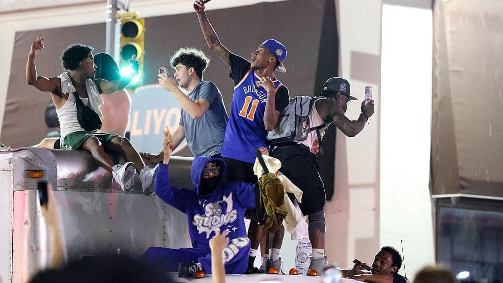 New York Knicks fans celebrate their side's big win