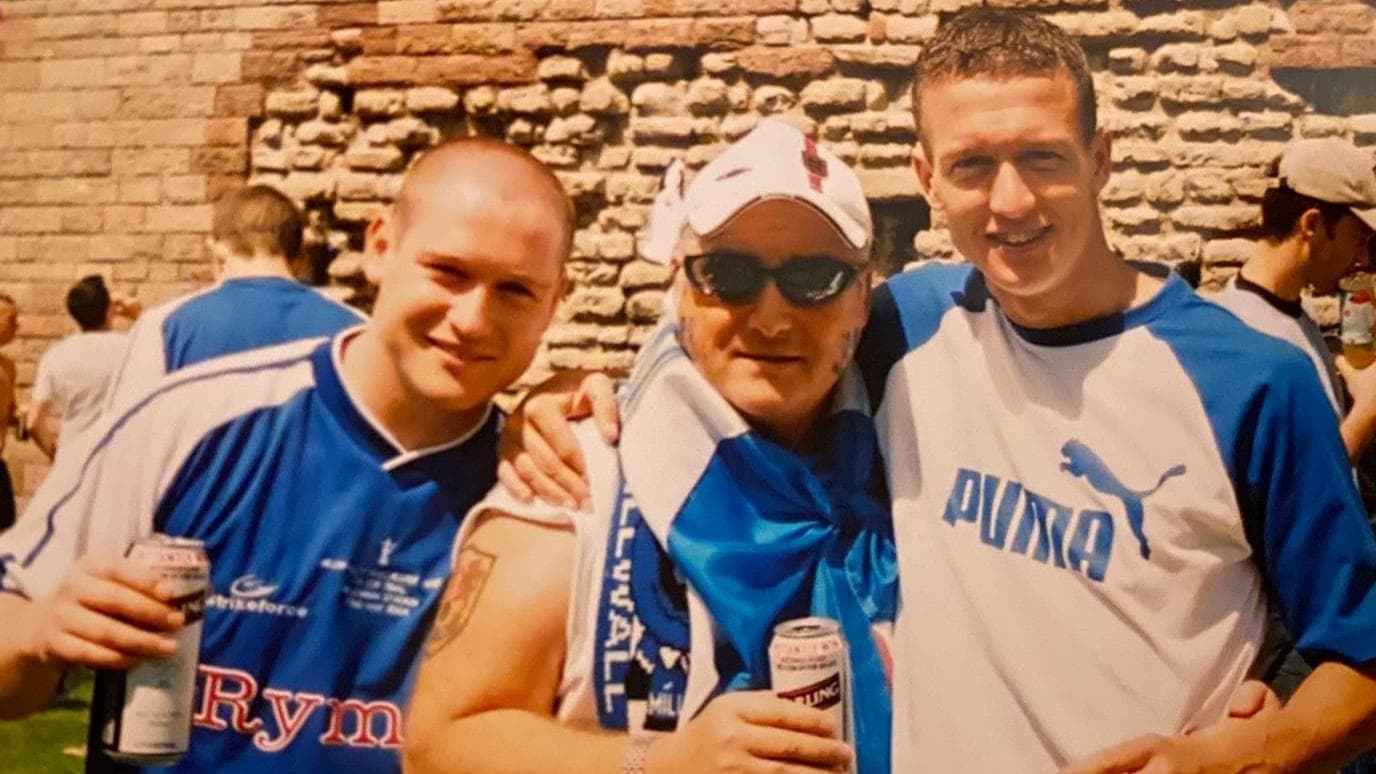 A photo of Matt and Mark Beard alongside their father following Millwall on a football away trip