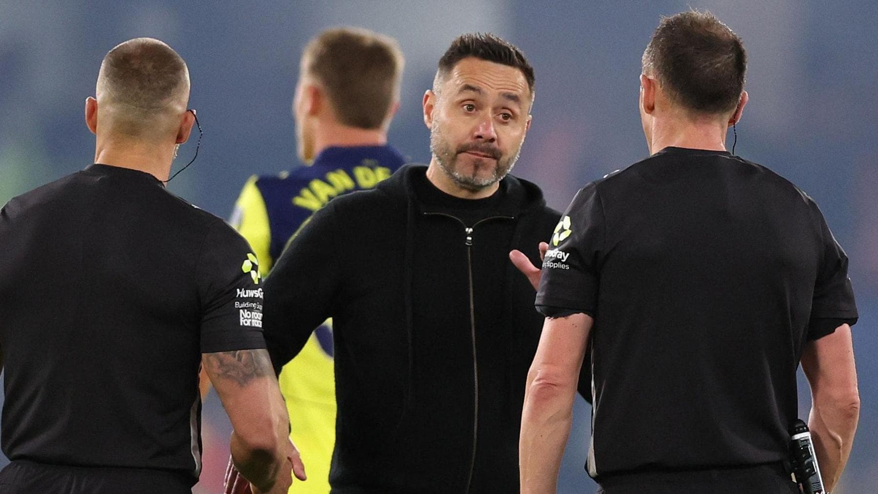 Spurs head coach in discussion with referee Stuart Attwell at the end of their Premier League loss to Chelsea at Stamford Bridge.