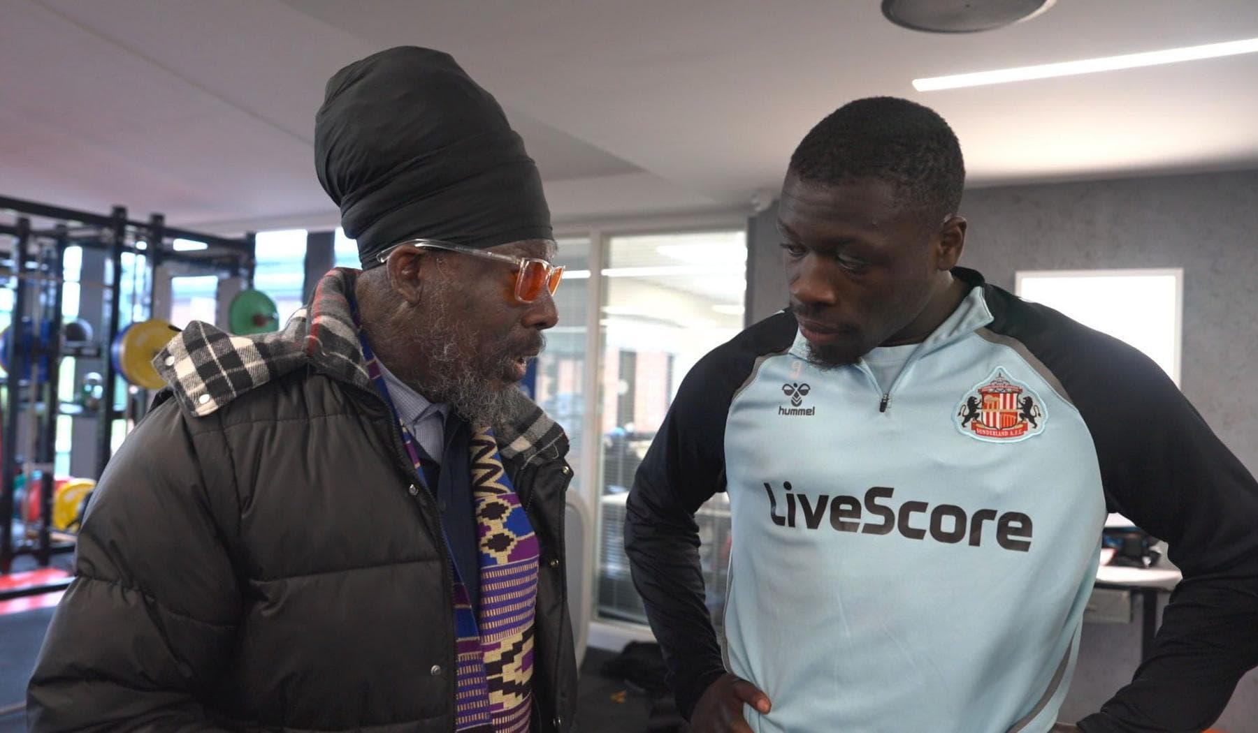 Roly Gregoire meets Sunderland striker Brian Brobbey in the gym at the club's training centre
