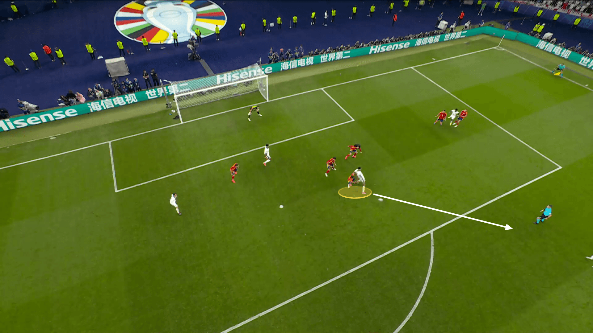 Screengrab from England's equaliser from the Euro 2024 final. This still shows Jude Bellingham passing it back to Cole Palmer on the edge of the box, shown by an arrow.