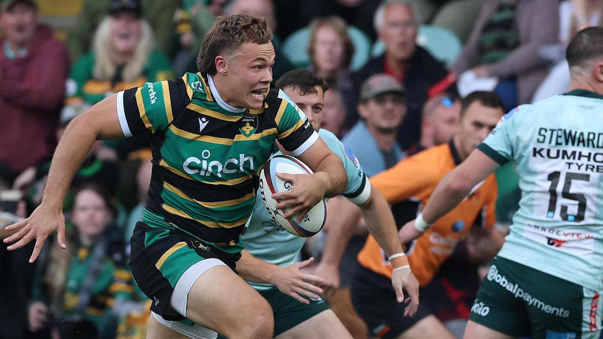 Tom Litchfield breaks through Leicester's defence to score Northampton's first try