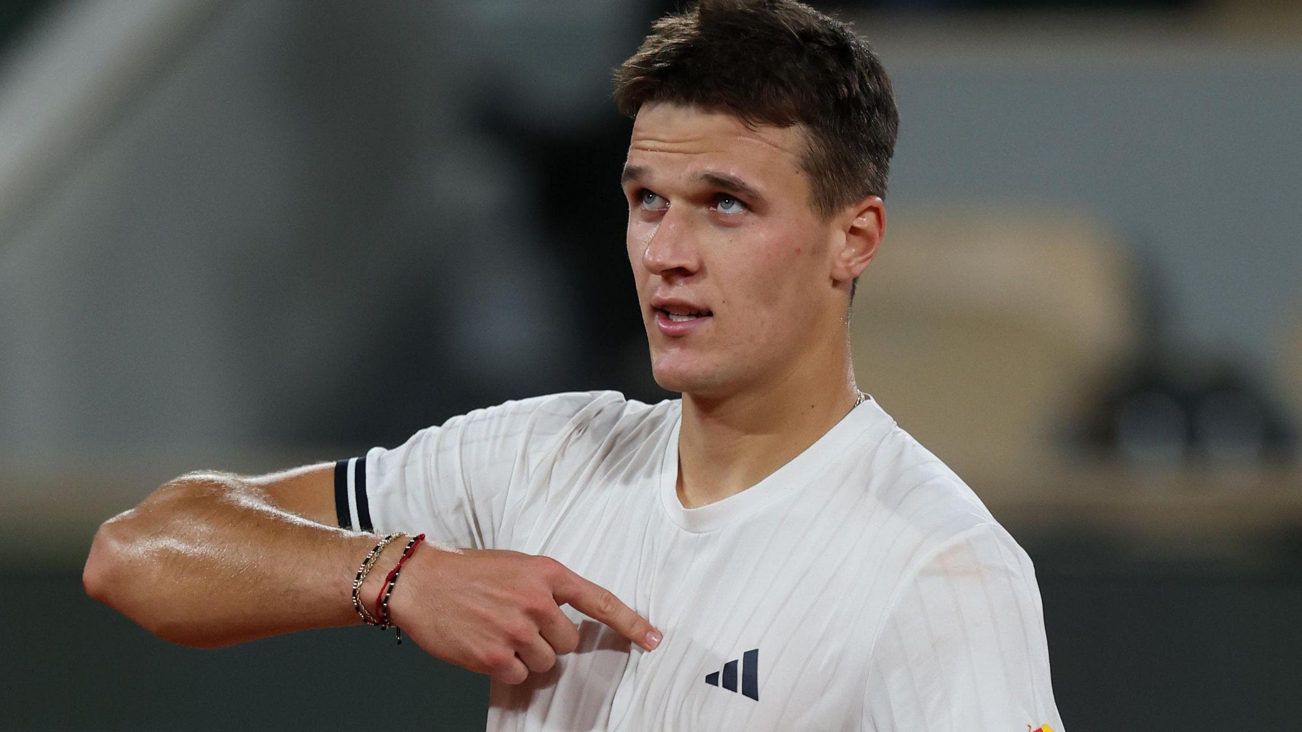 Jakub Mensik points to his heart after beating Joao Fonseca in the 2026 French Open quarter-finals
