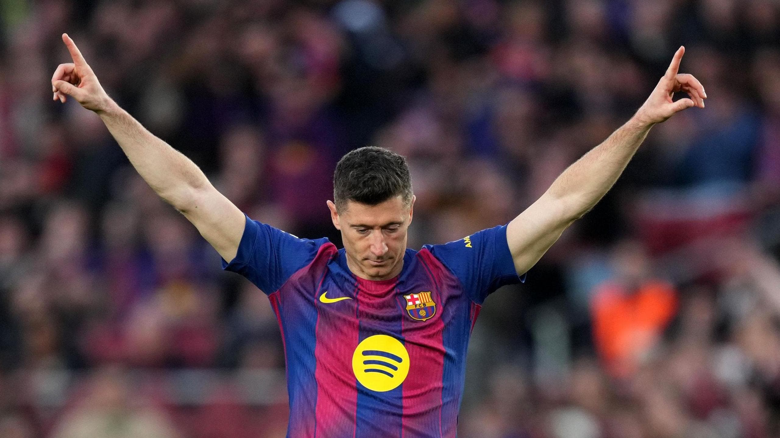 Barcelona striker Robert Lewandowski celebrates scoring