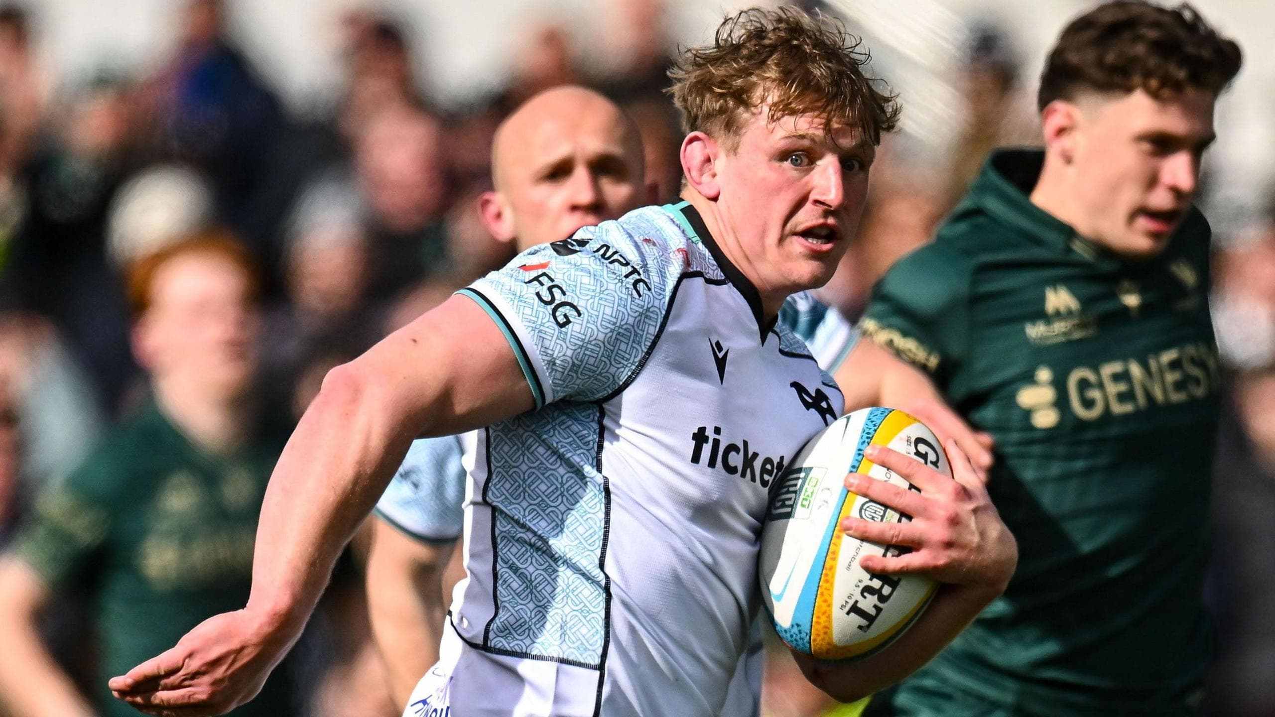 Jac Morgan carries the ball for Ospreys