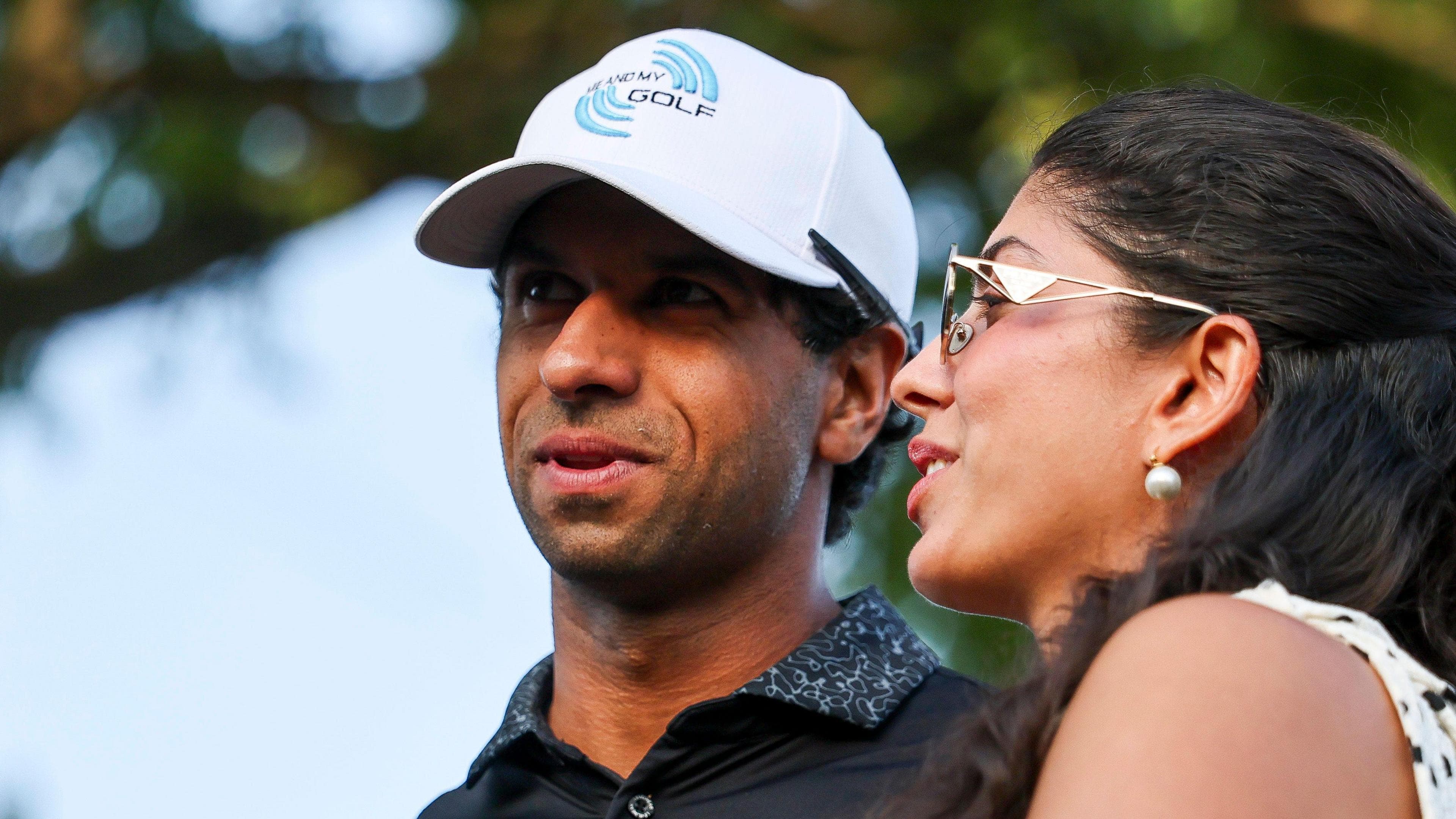 Aaron Rai and his wife Gaurika Bishnoi celebrate his US PGA title