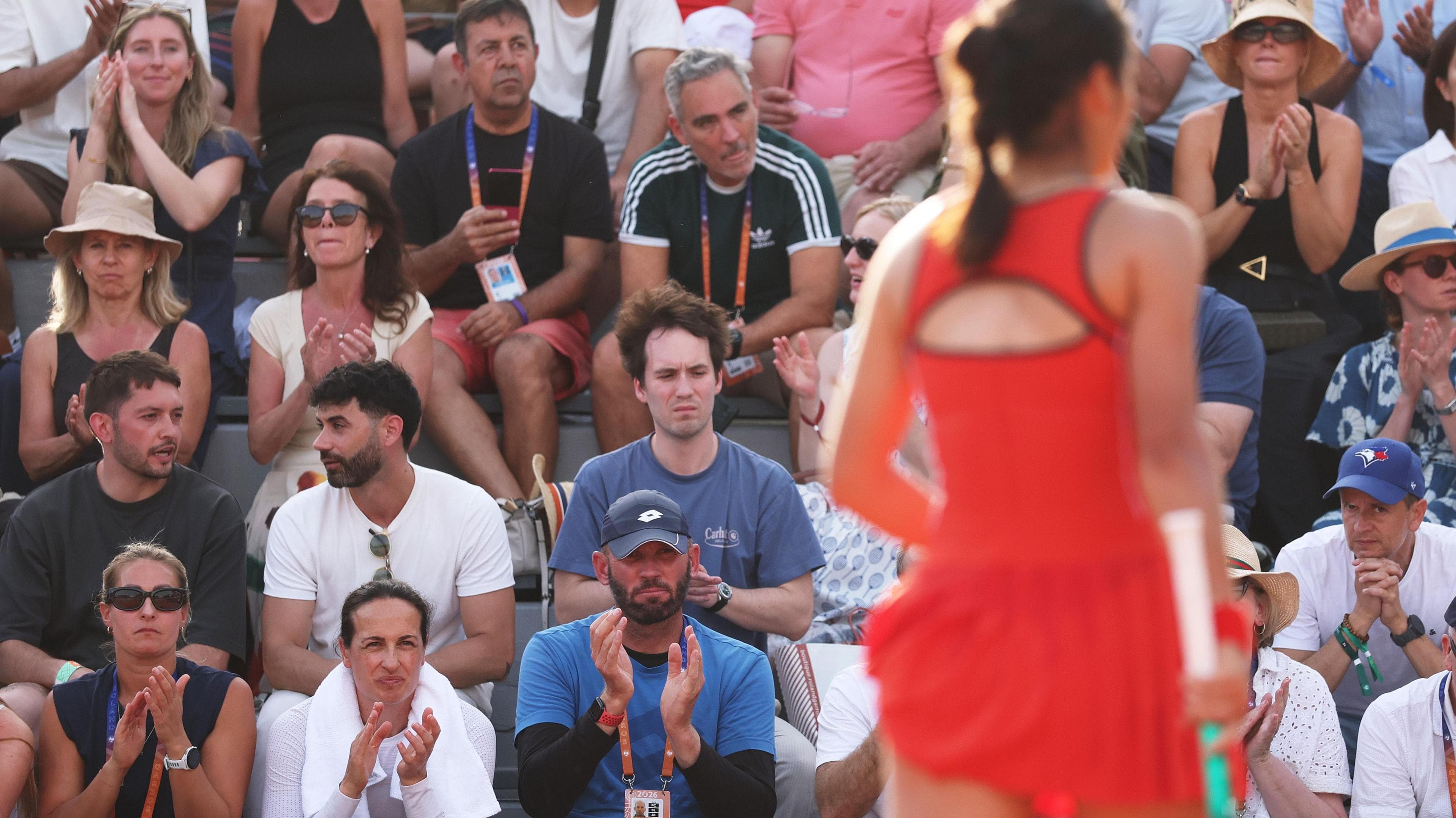 Andrew Richardson claps encouragement to Emma Raducanu at the 2026 French Open