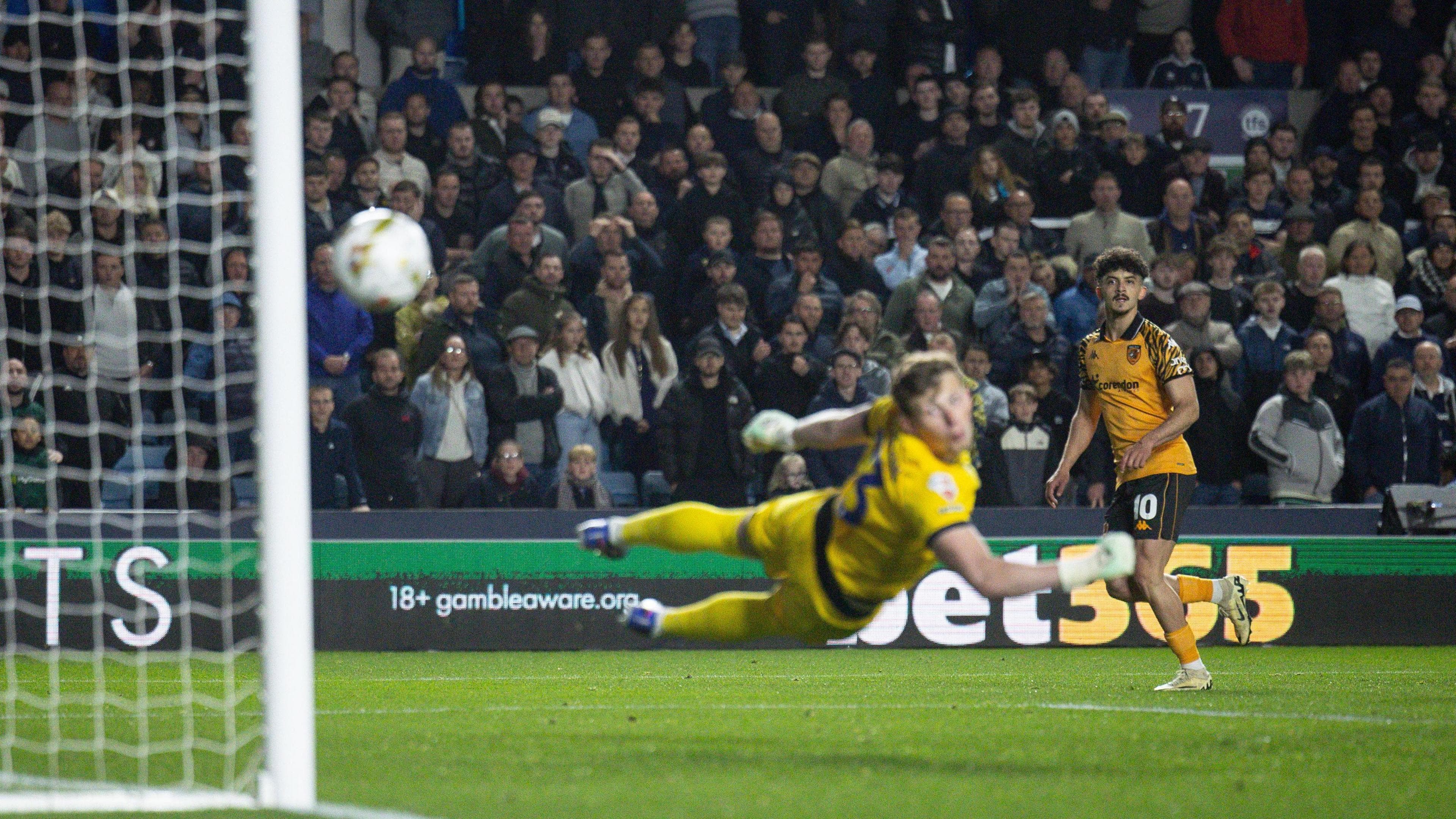 Mohamed Belloumi sends his finish around Millwall goalkeeper Anthony Patterson and into the far corner