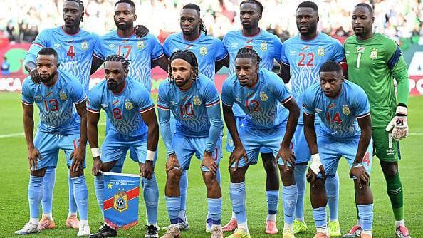 Democratic Republic of Congo's players dressed in blue and the goalkeeper in green pose for a picture during an Africa Cup of Nations match at the Prince Moulay Hassan Stadium in Morocco