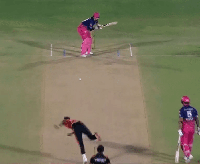 Vaibhav Sooryavanshi's bat moves out towards point as he prepares to make contact