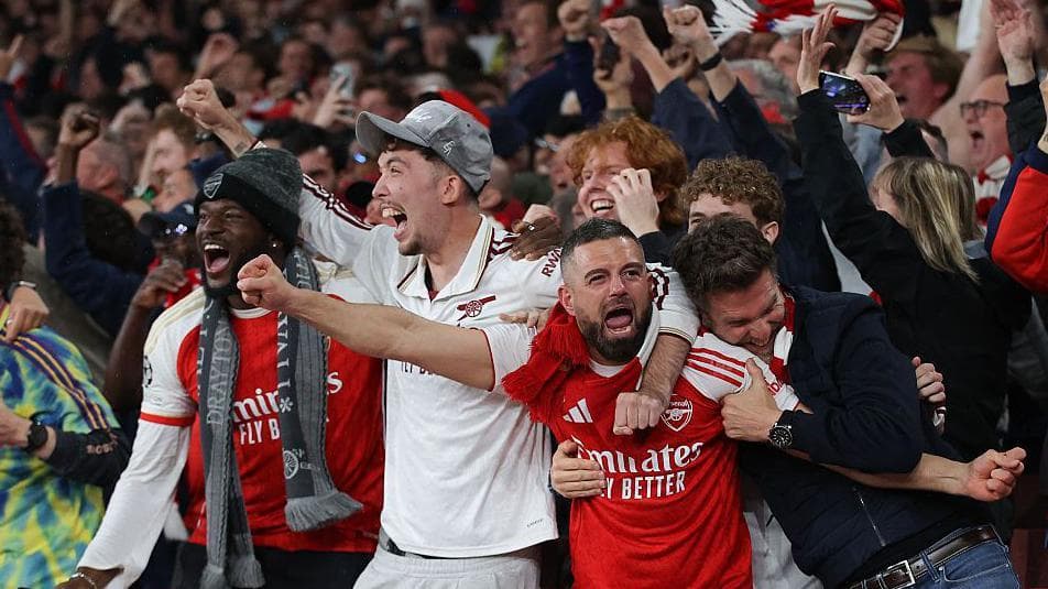 Arsenal fans players celebrate after the team reaches the 2026 Champions League final