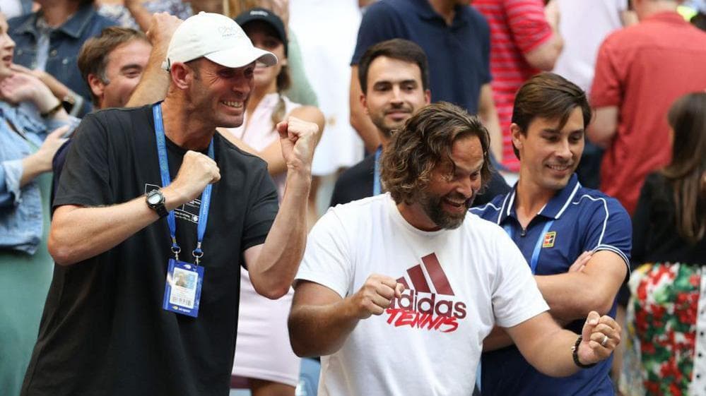 Coach Andrew Richardson and Emma Raducanu's support staff celebrate her 2021 US Open victory