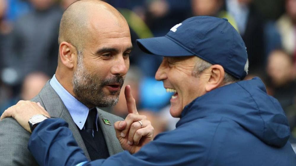 Pep Guardiola (left) and Tony Pulis, pictured laughing with each other when Manchester City played Pulis's West Brom team in May 2017