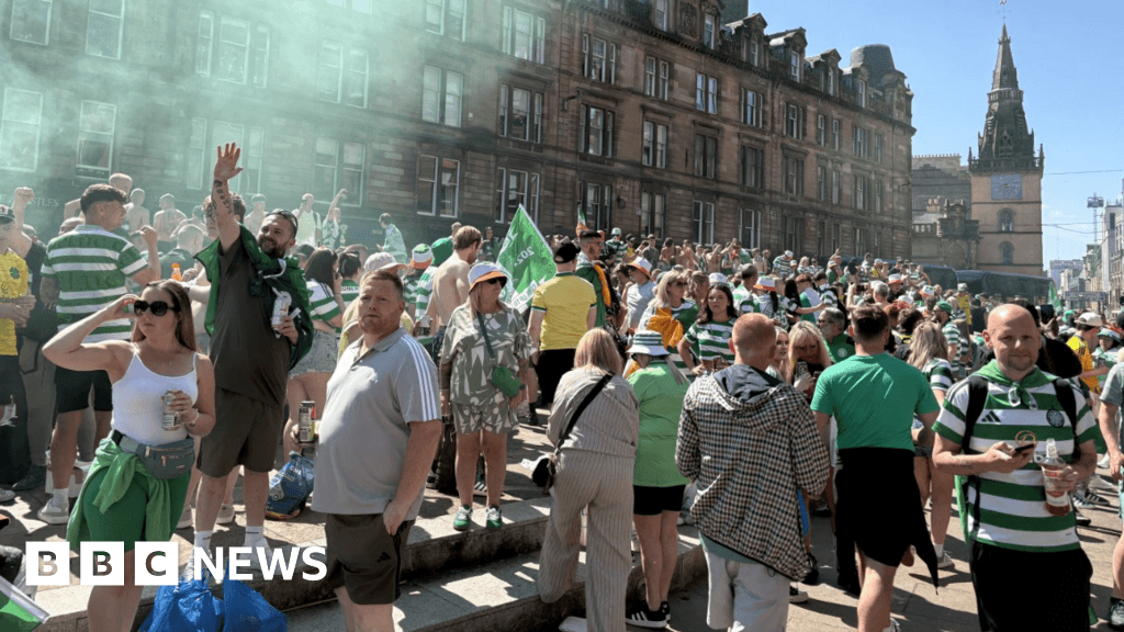 Jubilant Celtic fans celebrate after Hearts' title dreams are dashed